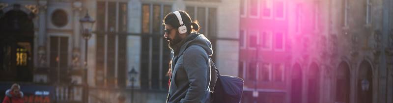 dude taking a walk with headphones